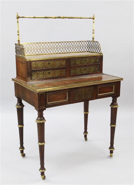 A Regency rosewood, brass marquetry, banded and mounted chevret table, attributed to John McLean, W.2ft 7in. D.1ft7in. H.4ft 1in.